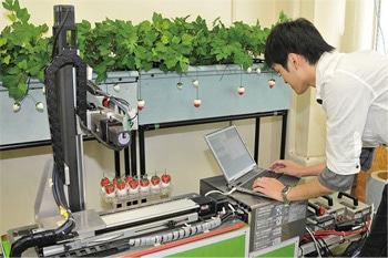 Research on self-propelled strawberry harvesting robot